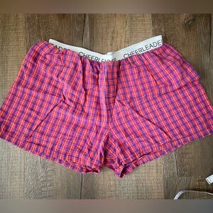 100% cotton ladies plaid shorts w/ cheerleader waistband